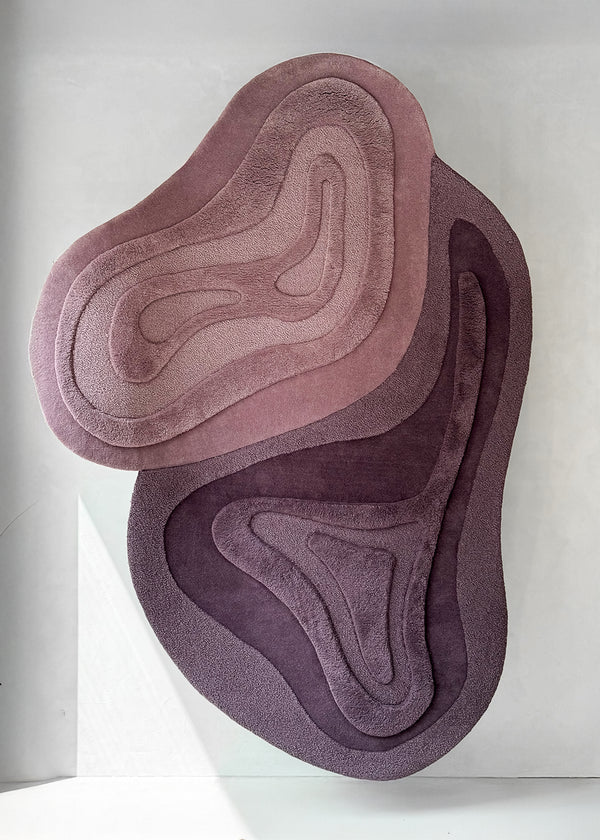 ALBA wool rug with layered organic shape in soft pink and deep purple tones – full view