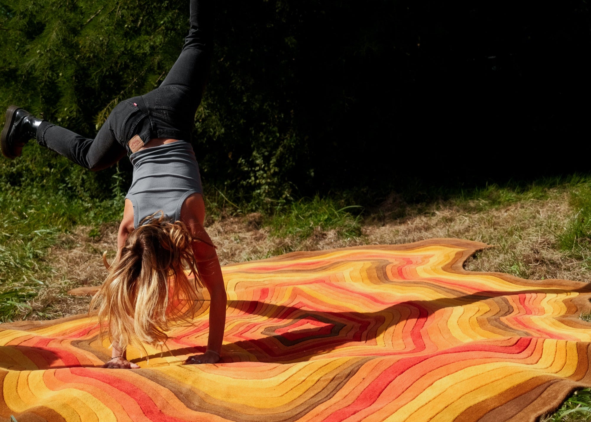 The Crystal statement rug in outdoor setting with layered crystal pattern